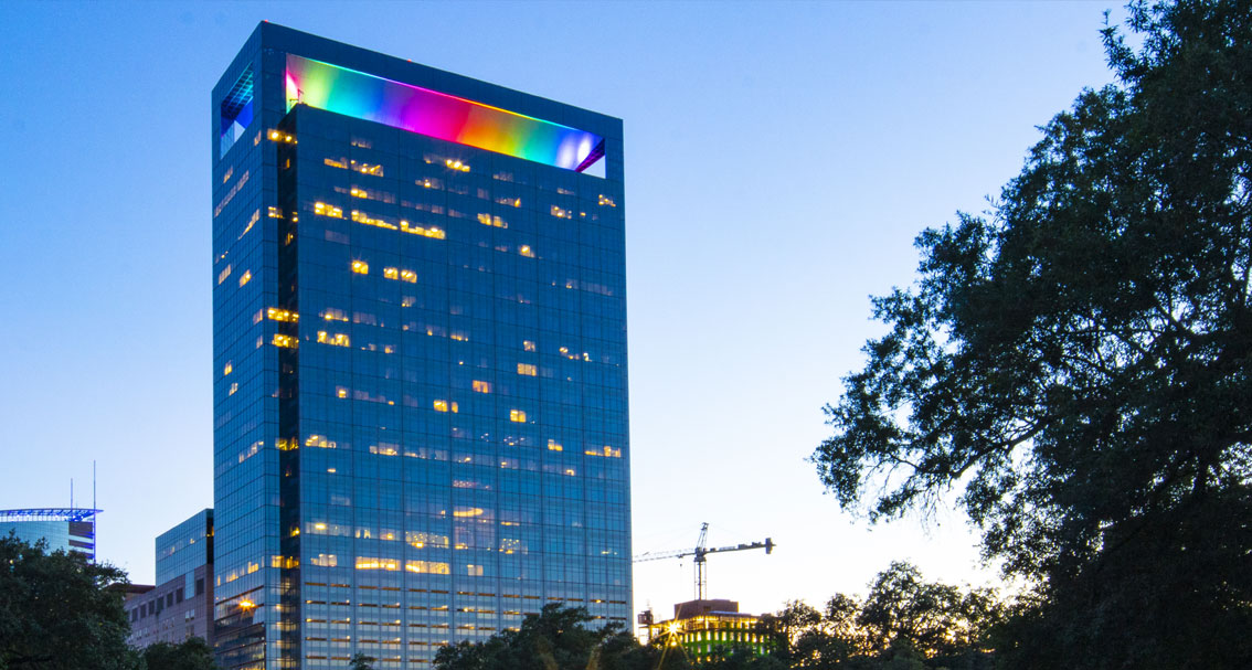 Modern building with light illumination on the top