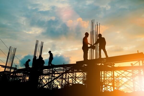 Workers on the metal structure