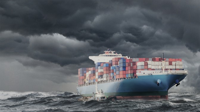 Transport ship with containers during a storm