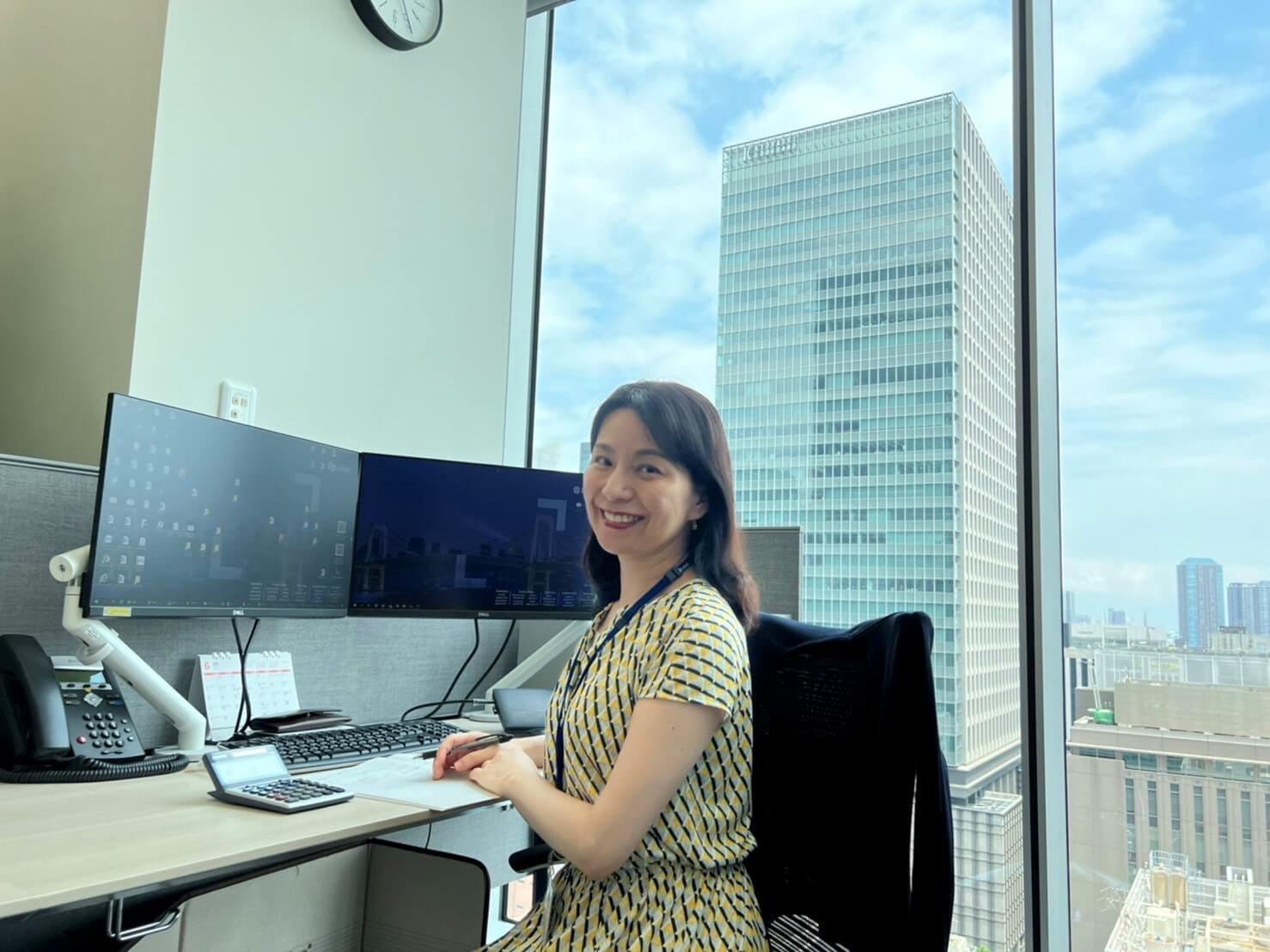 Izumi Watanabe sitting at the desk