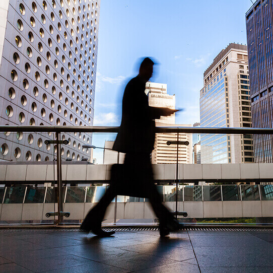 A blurry walking worker