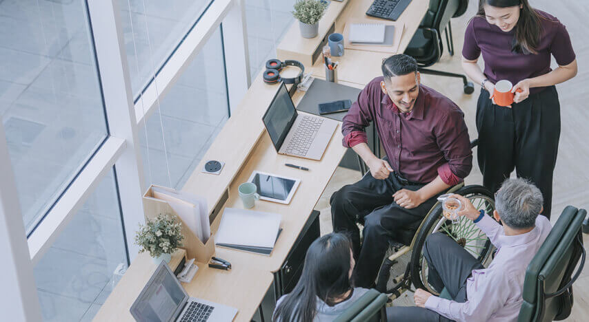 Employees talking in the office