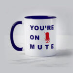 A mug with the words 'you're on mute'
