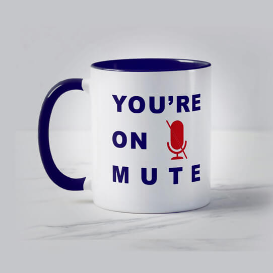 A mug with the words 'you're on mute'