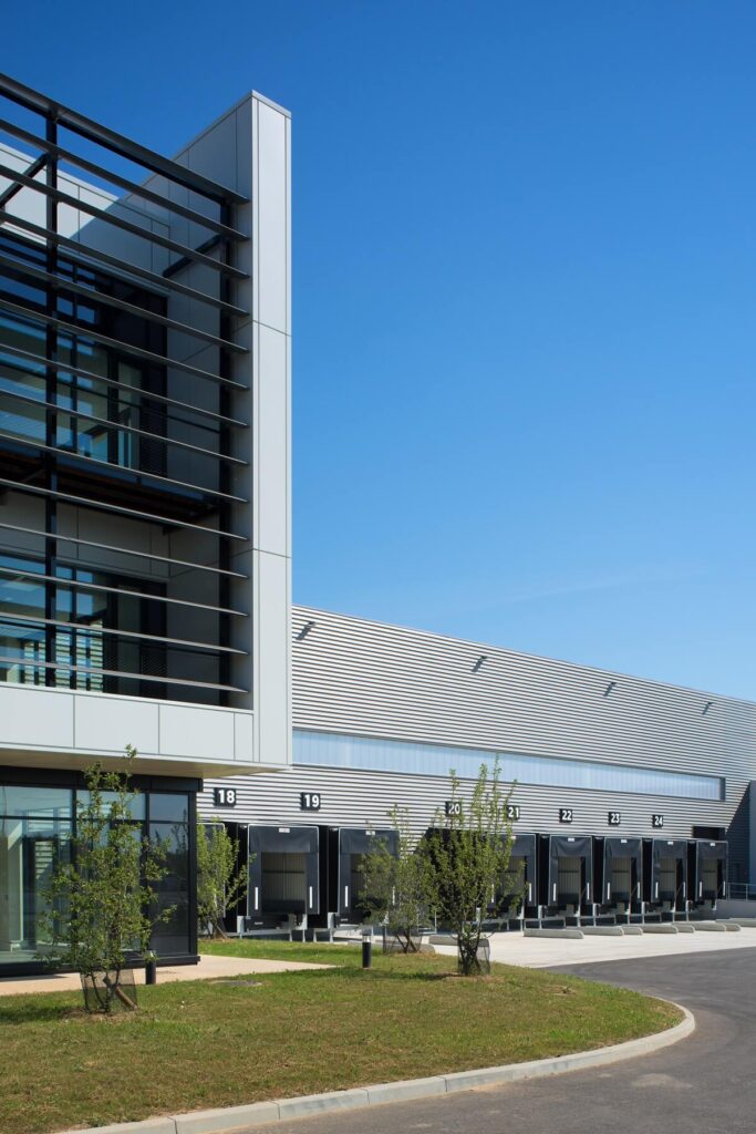 A warehouse with a place for loading trucks