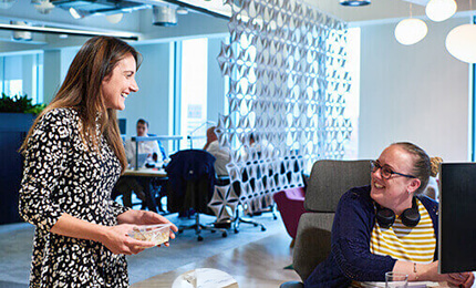 Two laughing coworkers