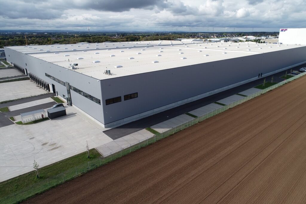 Warehouse by the field