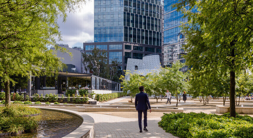 A small park around modern buildings