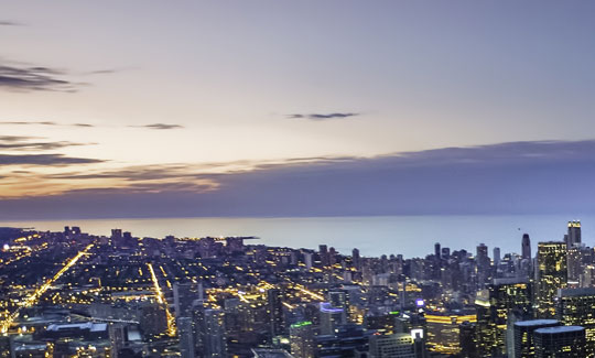 A panorama of the city against the setting sun