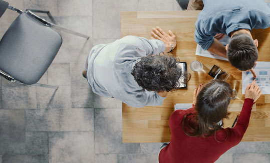 Top view of three people