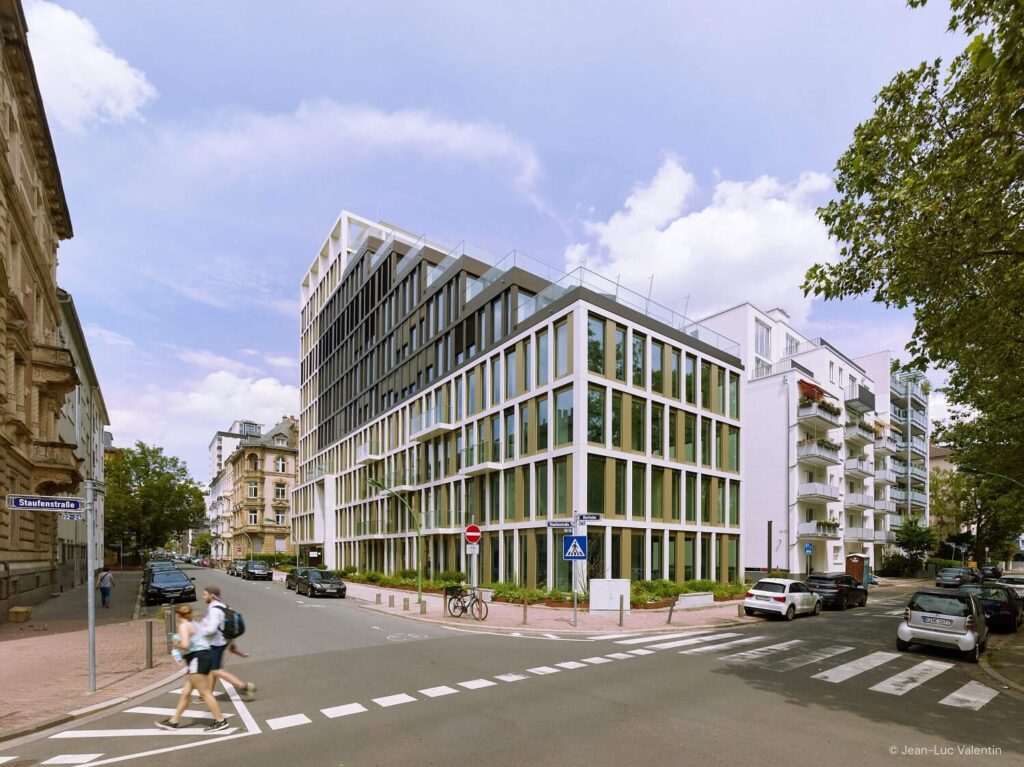 Glass building on the corner of the street