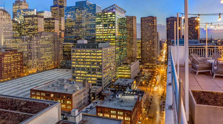 Rooftop view of a modern illuminated city