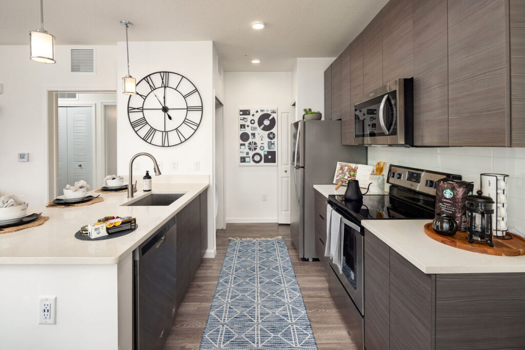 Light brown kitchen with full equipment