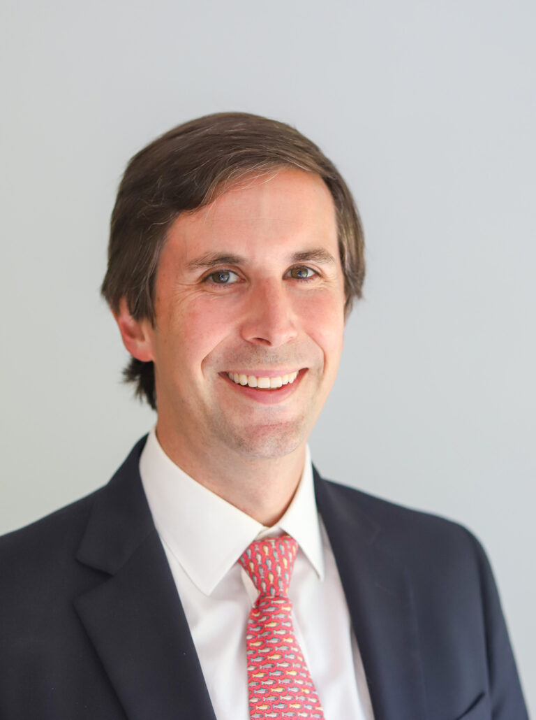 A headshot of Brett Hopkins